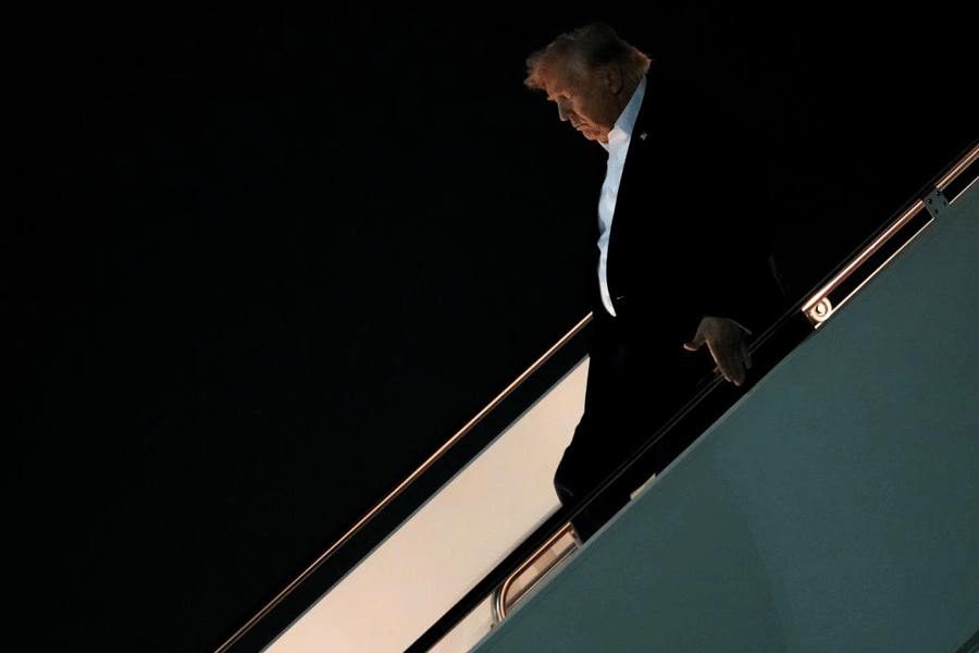 President Donald Trump disembarks Air Force One after attending the G7 summit in France, Thursday, June 18, 2026, at Joint Base Andrews, Md.