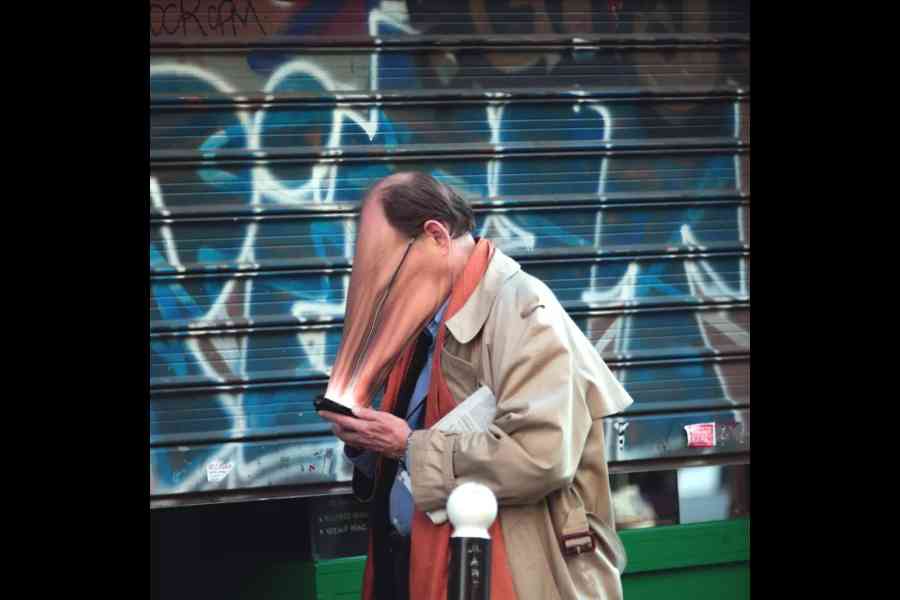 Artist Antoine Geiger’s SUR-FAKE series (2015) shows faces sucked by smartphones and screens