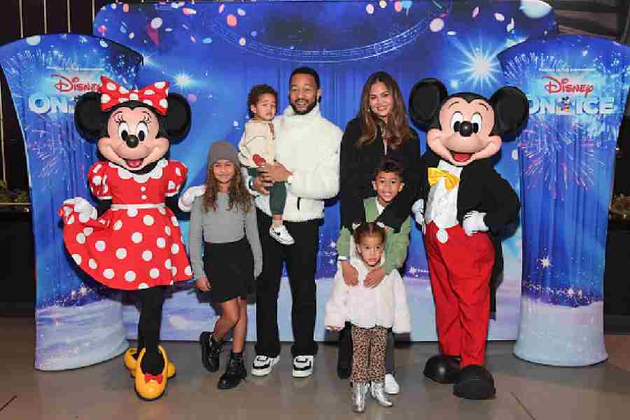 John Legend and Chrissy Teigen with their children