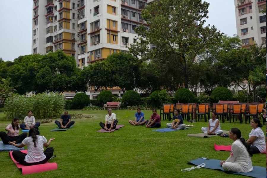 Residents of Diamond City West perform Yoga on International Yoga Day