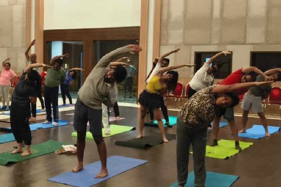 Residents of South City Residency perform Yoga on International Yoga Day