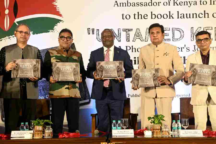 (From left) Author Shiladitya Chaudhury, Kenyan ambassador to India Peter Munyiri and honorary consul Pranay Poddar at the launch of the coffee table book on Tuesday.