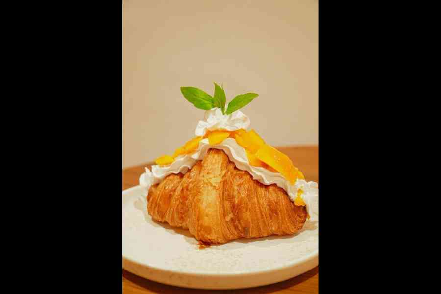 Butter Croissant with Fresh Cream, topped with Mango Marmalade and Fresh Mango 