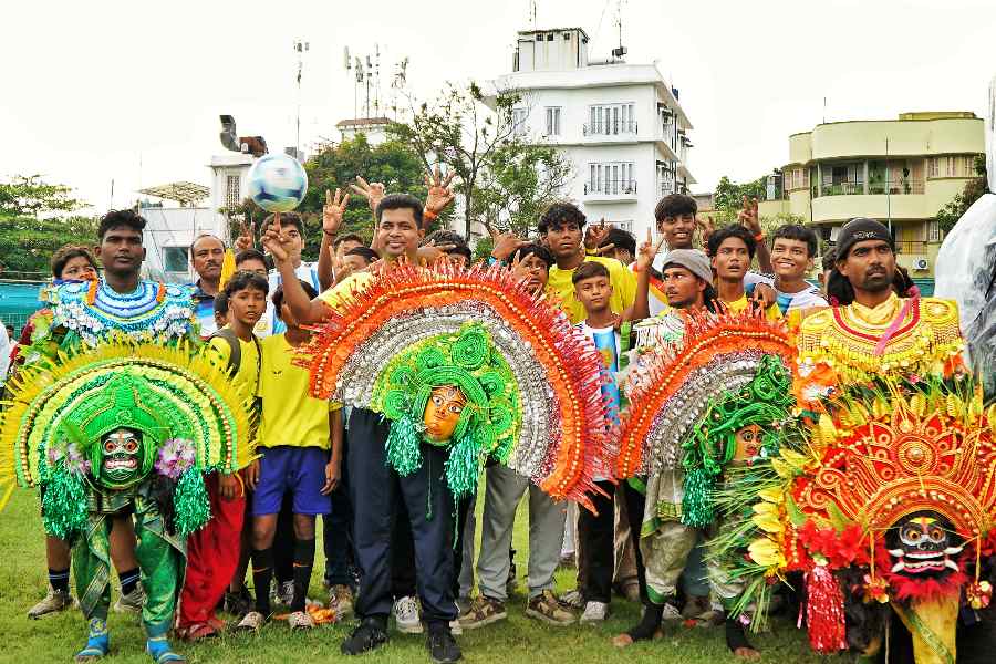 Chhau dancers performed, adding a carnival aftertaste to a football crowd