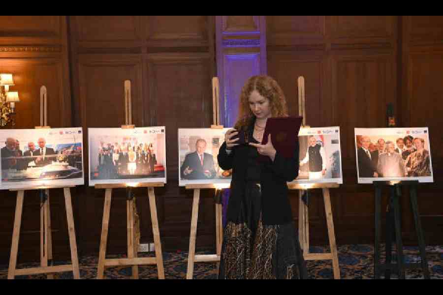 Ekaterina Tyurina, vice consul and head of protocol, in front of an exhibition of photographs tracing Indo-Russian friendship down the years