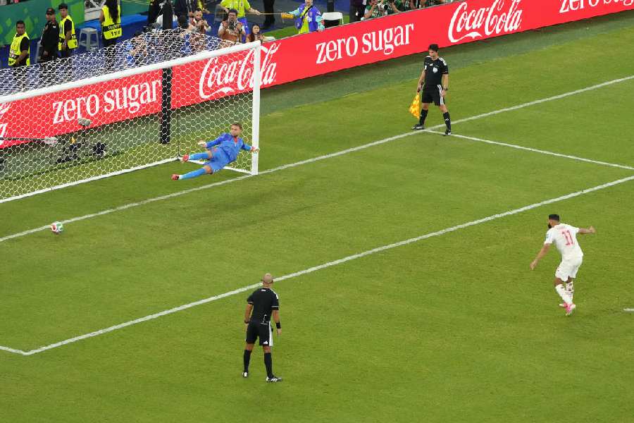 Morocco's Ismael Saibari (11) scores against Netherlands goalkeeper Bart Verbruggen (1) in a penalty shootout at the end of the World Cup round of 32 soccer match between the Netherlands and Morocco in Guadalupe, near Monterrey, Mexico, Monday, June 29, 2026.