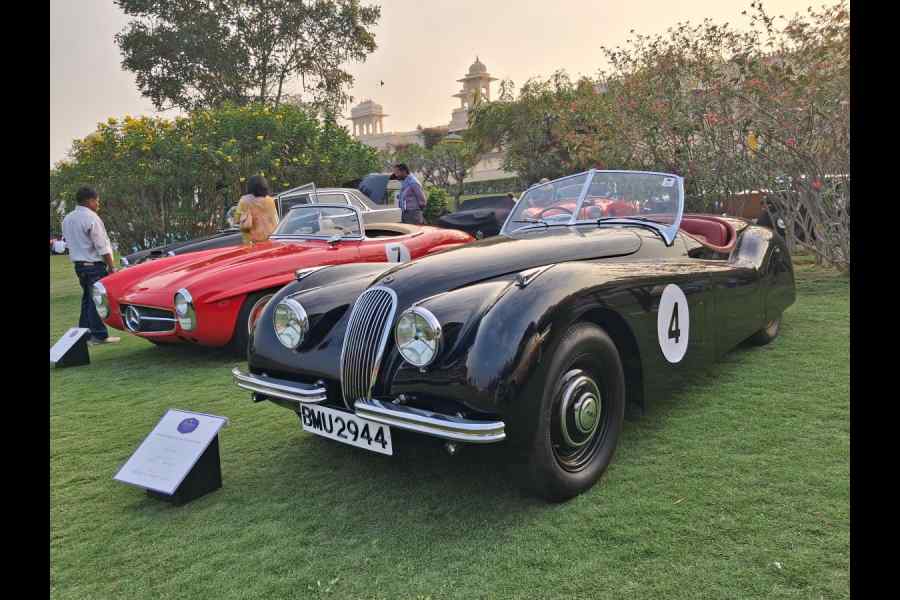 The Maharaja of Gondal had bought the 1956 Mercedes-Benz 300SL 'Gullwing' (left) and removed bumpers and raced this car regularly. The 1951 Jaguar XK120 was the first sportscar from the company after World War II and claimed to be able to reach the 120mph mark. This particular car participated in races in India