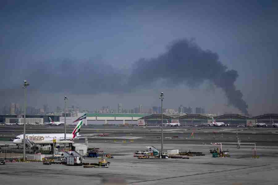 Emirates airplanes are parked at the Dubai International Airport after its closure in Dubai, United Arab Emirates, Sunday, March 1, 2026.