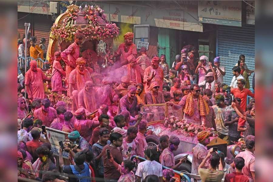 Idols of Krishna and Radha reside on the chariot of colours, entering Sona Patti, Burrabazar