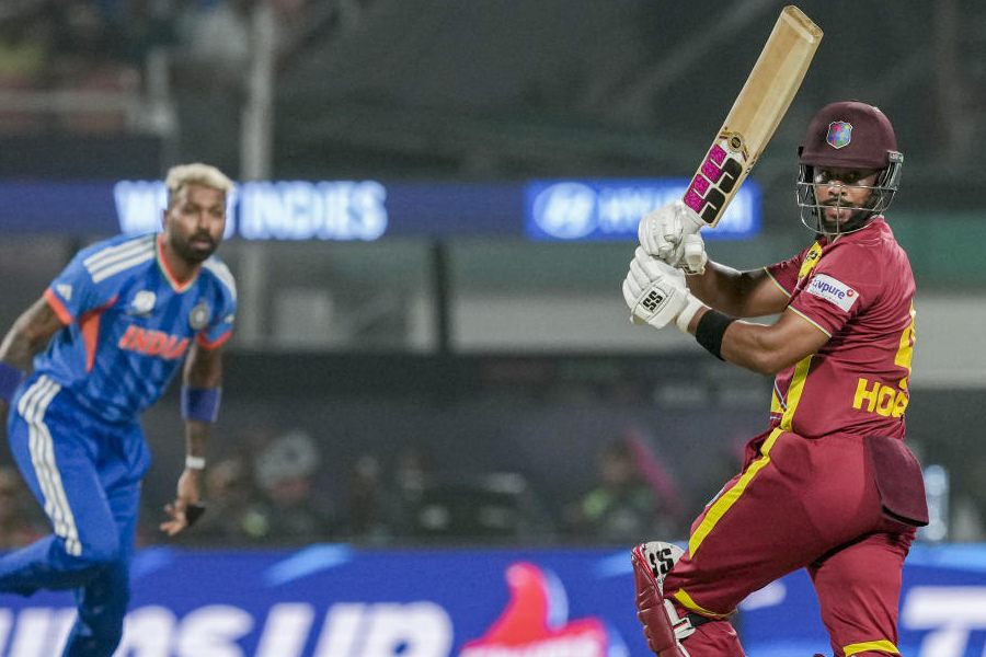 West Indies' captain Shai Hope, right, plays a shot as India's Hardik Pandya looks on, during the ICC Men's T20 World Cup 2026 cricket match between India and West Indies, at the Eden Gardens, in Kolkata, West Bengal, Sunday, March 1, 2026.