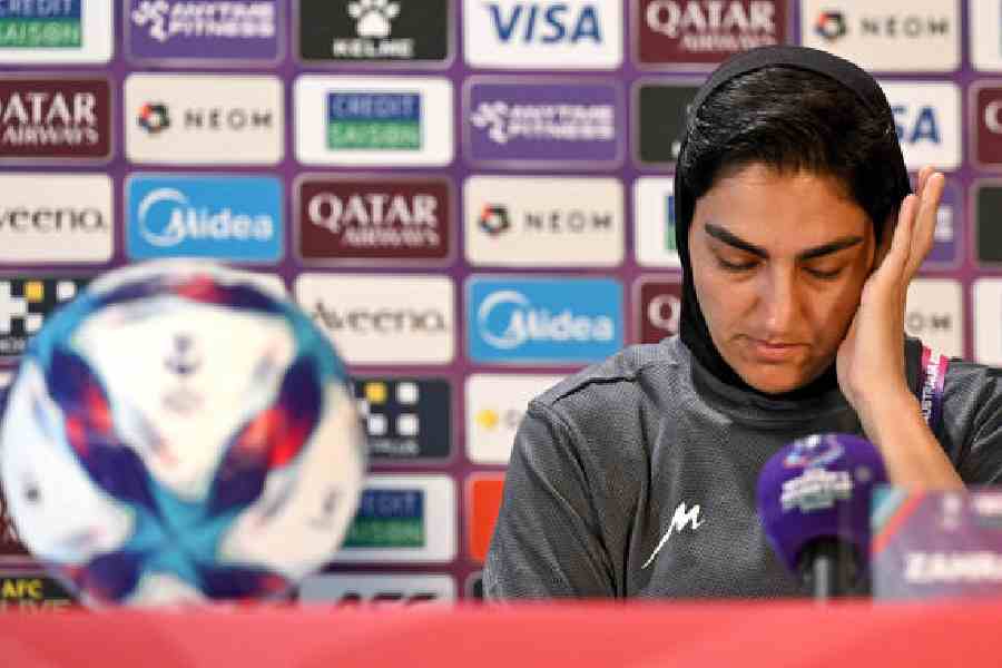 Zahra Ghanbari, Iranian women's national football team captain, reacts during Sunday's news conference ahead of the 2026 AFC Women's Asian Cup match against South Korea in Gold Coast, Australia.