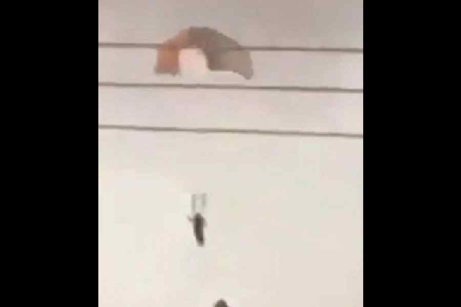 The pilot ejects from the aircraft using a parachute. 