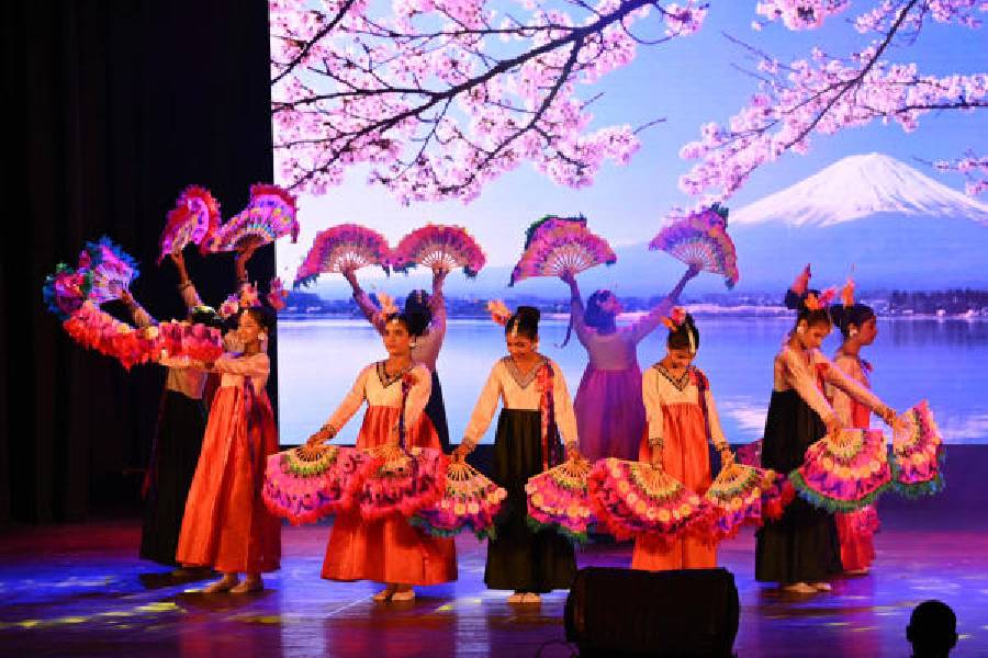 Children perform at the programme at Madhusudan Mancha.
