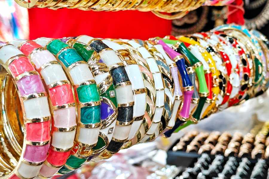 To match your quirky rings, you have these vibrant, enamel bangles. 