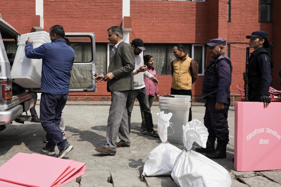 Polling officials load election materials into a vehicle after collecting them from a distribution center ahead of general election, in Kathmandu, Nepal, March 4, 2026.