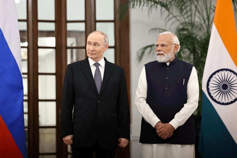 FILE PHOTO: Russia's President Vladimir Putin and India's Prime Minister Narendra Modi attend a meeting in New Delhi, India, December 5, 2025.