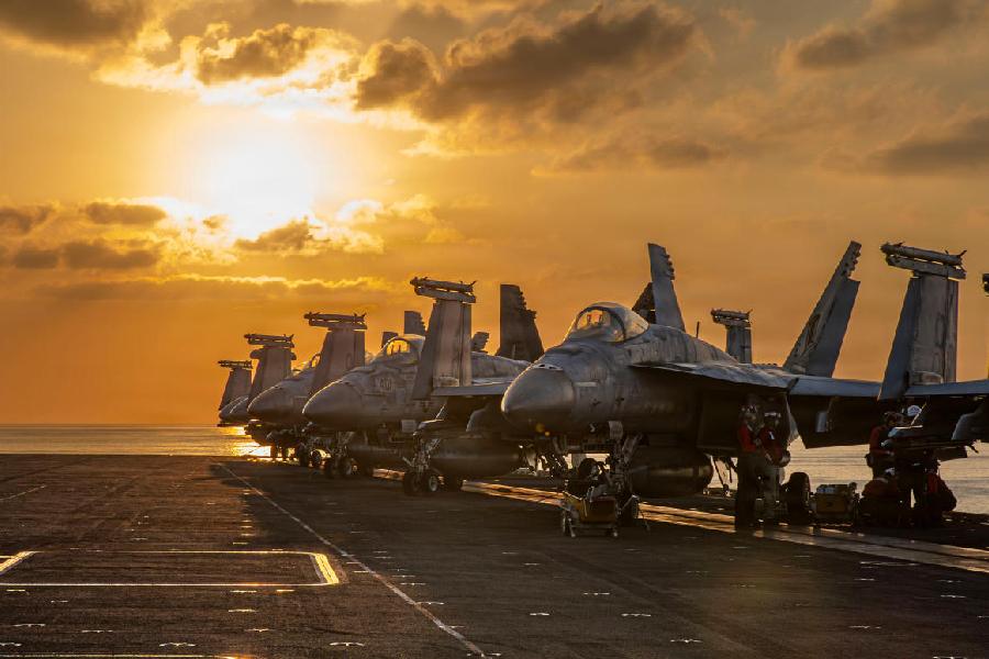 Aircraft on the flight deck of the USS Abraham Lincoln (CVN 72) that are operating in support of the war in Iran