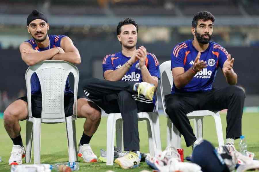 Jasprit Bumrah with Arshdeep Singh and Abhishek Sharma, during a break in practice at the Wankhede. South Africa’s Temba Bavuma is batting for India to reach Sunday’s final. 