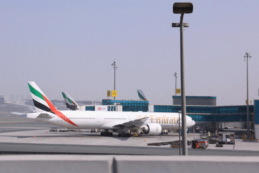 FILE PHOTO: Planes parked at Terminal 3 of Dubai International Airport after tU.S. and Israeli attacks on Iran, in Dubai, United Arab Emirates, March 2, 2026.
