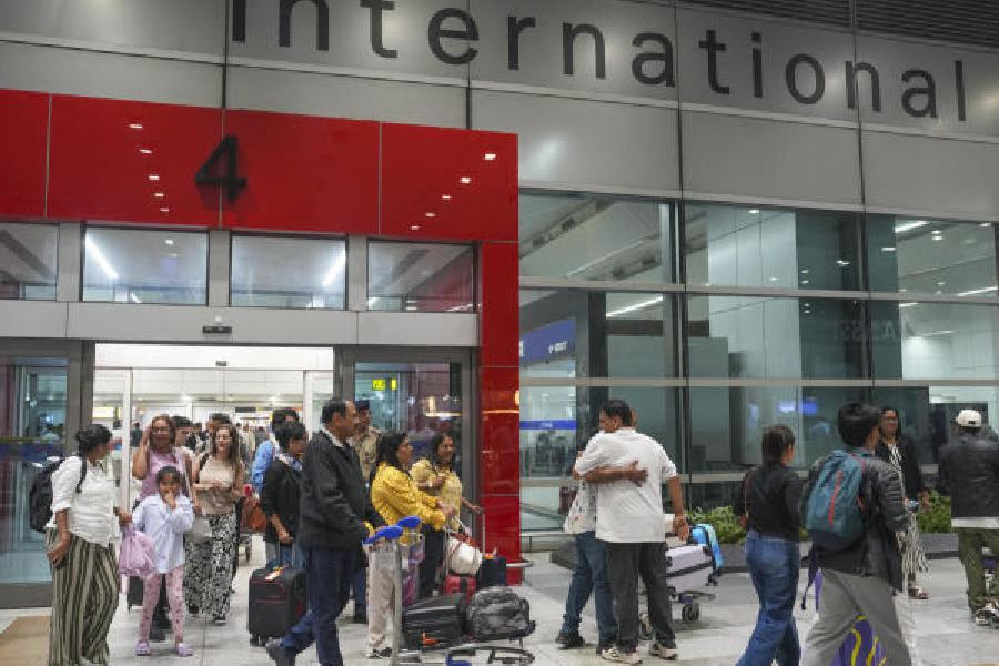 Stranded passengers arrive in Delhi from Abu Dhabiearlier this week.