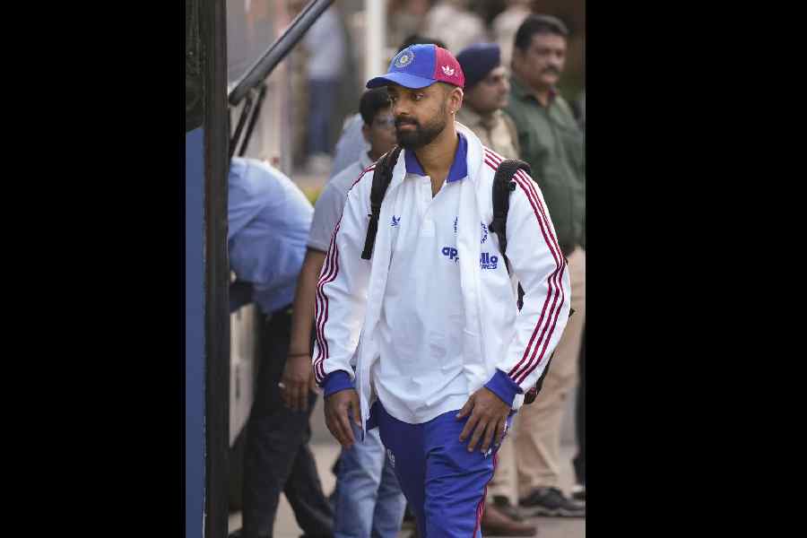 Varun Chakravarthy arrives in Ahmedabad onFriday, ahead of India’s T20 World Cup finalagainst New Zealand. (PTI)
