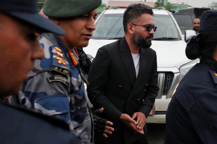 Balendra Shah, a rapper-turned-politician and the prime ministerial candidate for RSP, arrives at the counting centre to collect his winning certificate from election officials, in Damak, Jhapa district, Nepal, March 7, 2026.
