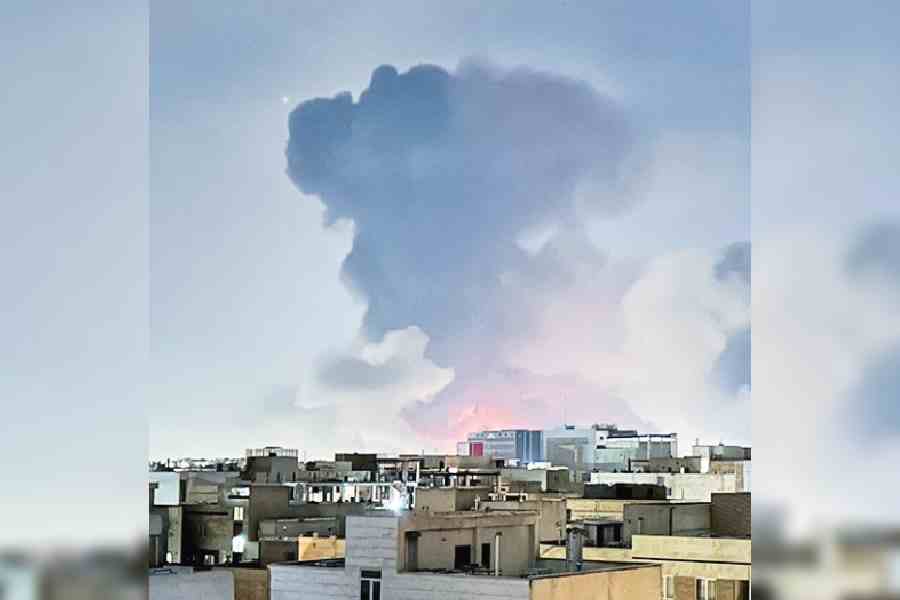 Smoke rises from an explosion in Tehran on Saturday.