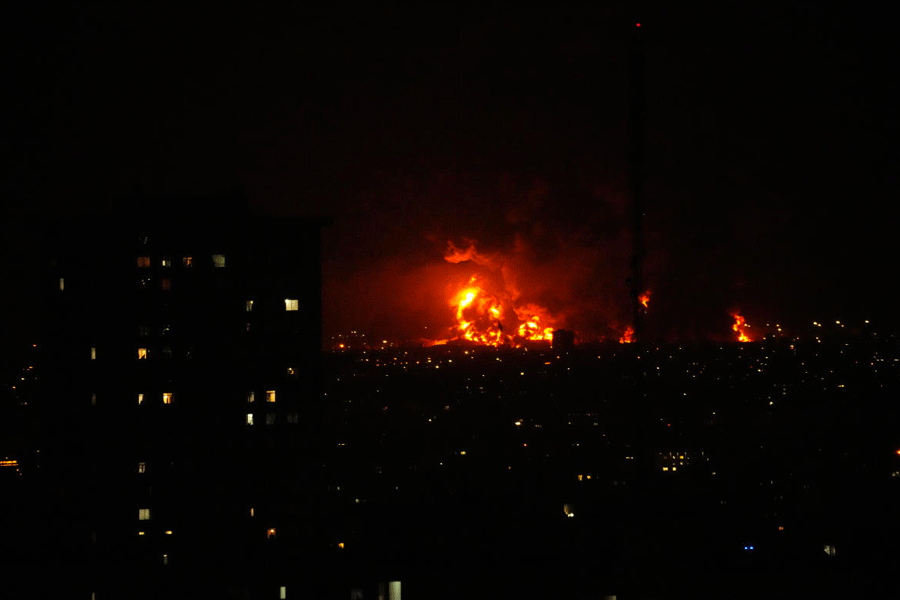 Flames rise from an oil storage facility south of the capital Tehran as strikes hit the city during the U.S.‚ÄìIsrael military campaign, Iran, Saturday, March 7, 2026.