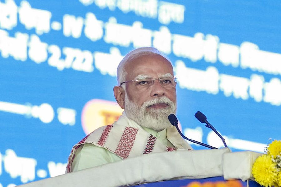 In this image received on March 8, 2026, Prime Minister Narendra Modi addresses the gathering during the inauguration and foundation stone laying ceremony of multiple development projects, New Delhi.