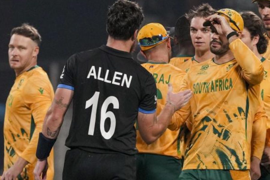 The South Africa team congratulates New Zealand’s Finn Allen after his century, at the Eden Gardens