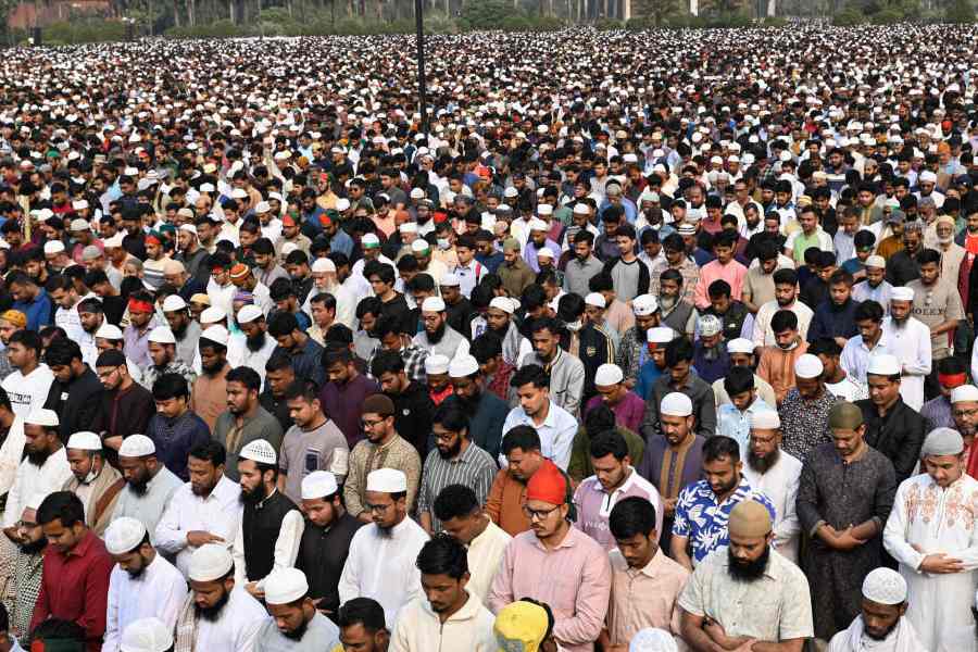 Thousands of people offer funeral prayers for leading Bangladeshi activist Sharif Osman Hadi, who died from gunshot wounds sustained in an attack in Dhaka earlier this month, outside the nation's Parliament complex in Dhaka, Bangladesh, Saturday, Dec. 20, 2025.