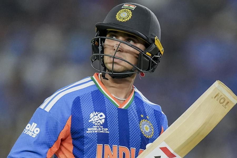 India's Abhishek Sharma reacts as he returns to the pavilion after his dismissal by New Zealand's Rachin Ravindra during the ICC Men's T20 World Cup 2026 final cricket match between India and New Zealand, at Narendra Modi Stadium, in Ahmedabad, Gujarat, Sunday, March 8, 2026.