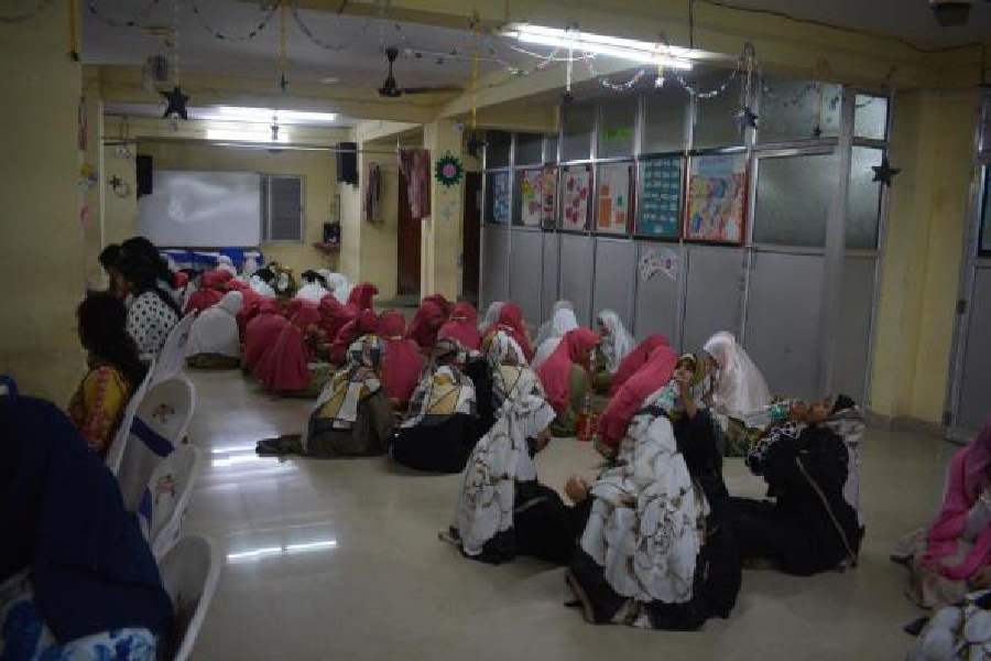 Women at the interfaith Iftar at Deeniyat Muallima College in Howrah