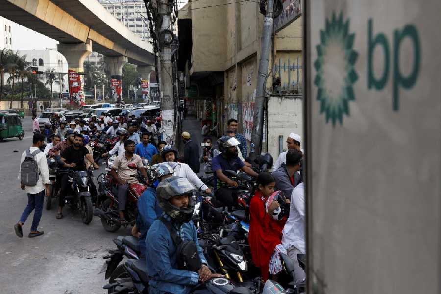 Vehicles queue at a fuel station, as concerns grow over fuel supplies following U.S.-Israel conflict with Iran, in Dhaka, Bangladesh