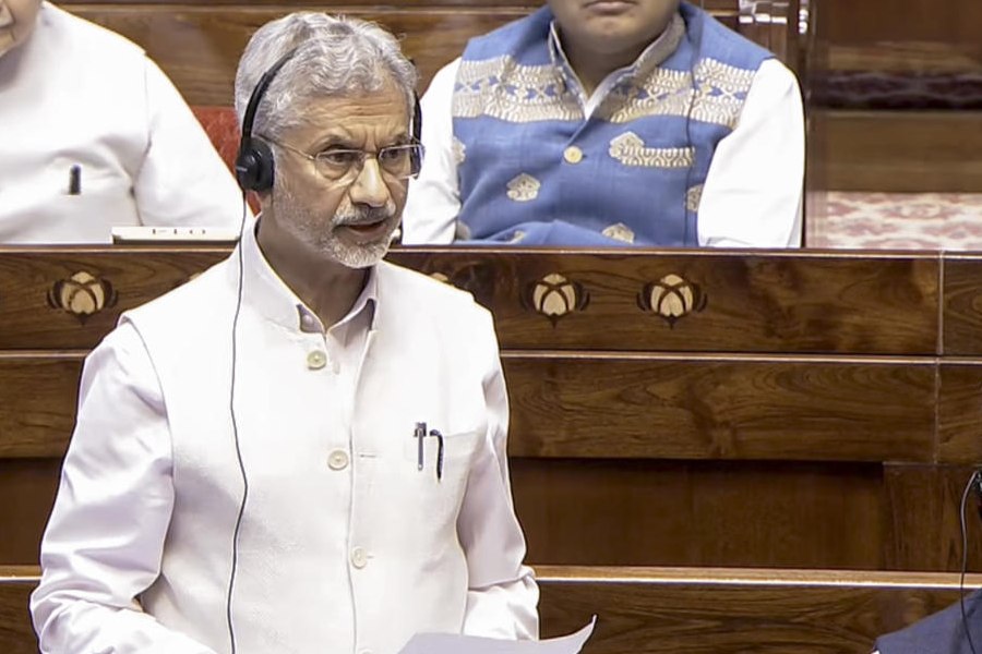 External Affairs Minister S Jaishankar, left, speaks in the Rajya Sabha during the Budget session of Parliament, in New Delhi, Monday, March 9, 2026.