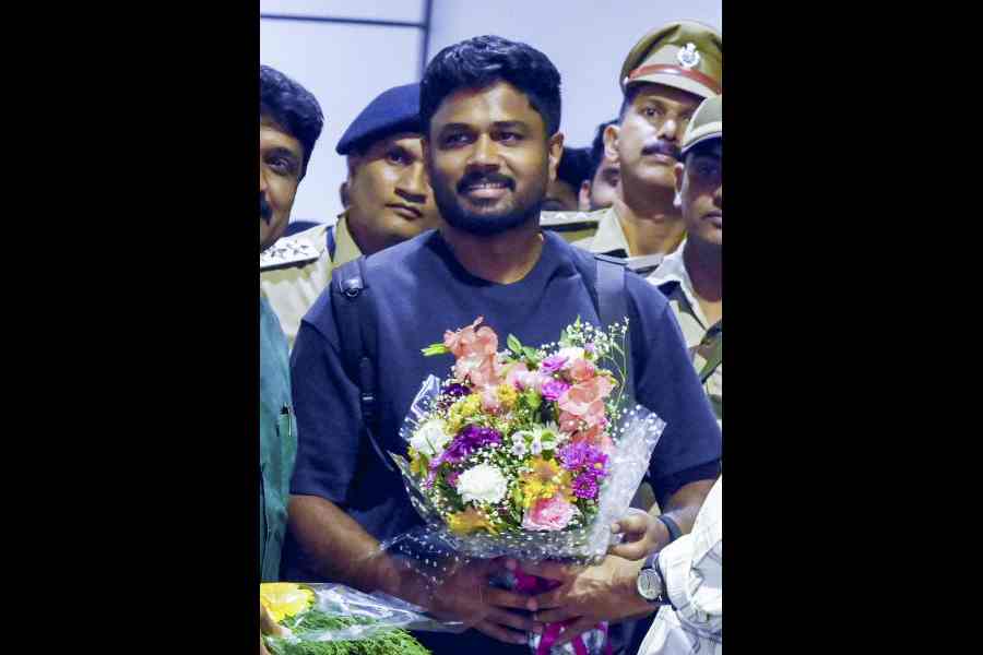 Sanju Samson, the Player of the Tournament, on his arrival at the Thiruvananthapuram International Airport on Monday.