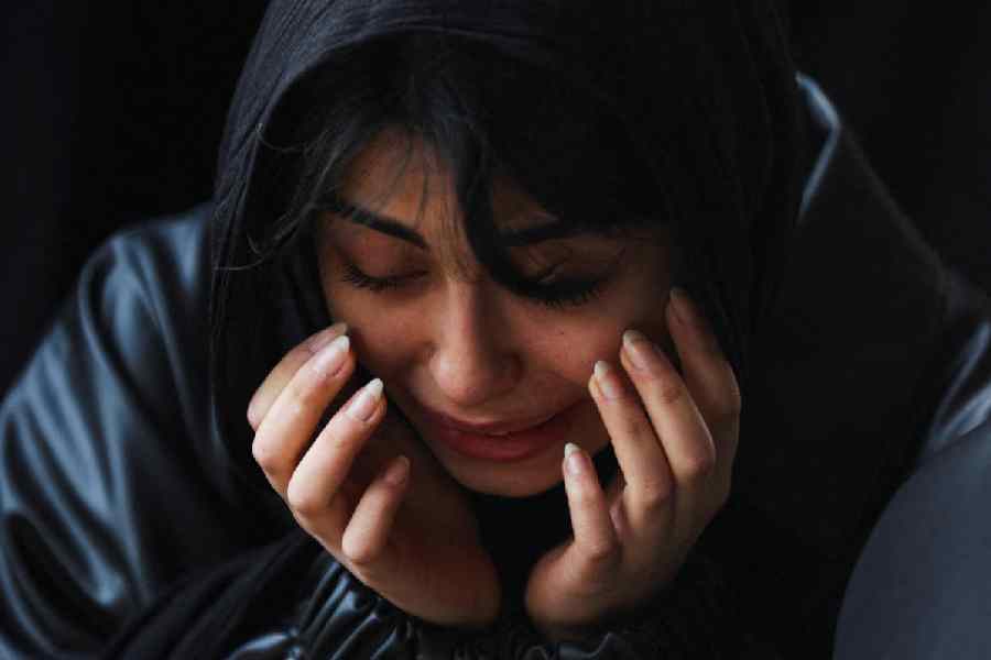 A mourner at a funeral in Tehran on Monday for victims of US-Israel strikes.