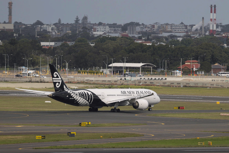 FILE PHOTO: An Air New Zealand plane is seen taxiing from the international terminal at Sydney Airport.