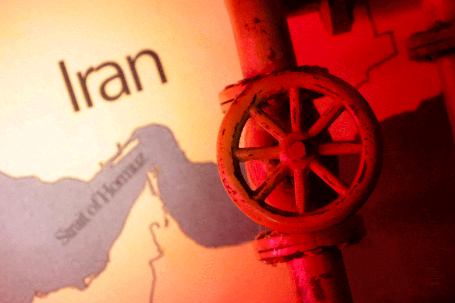 FILE PHOTO: A map showing the Strait of Hormuz and Iran is seen behind a 3D printed oil pipeline in this illustration taken June 22, 2025.