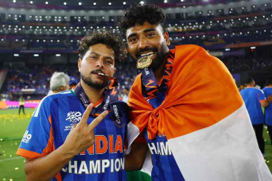Kuldeep Yadav celebrates with Mohammed Siraj after India’s T20 World Cup triumph on Sunday.