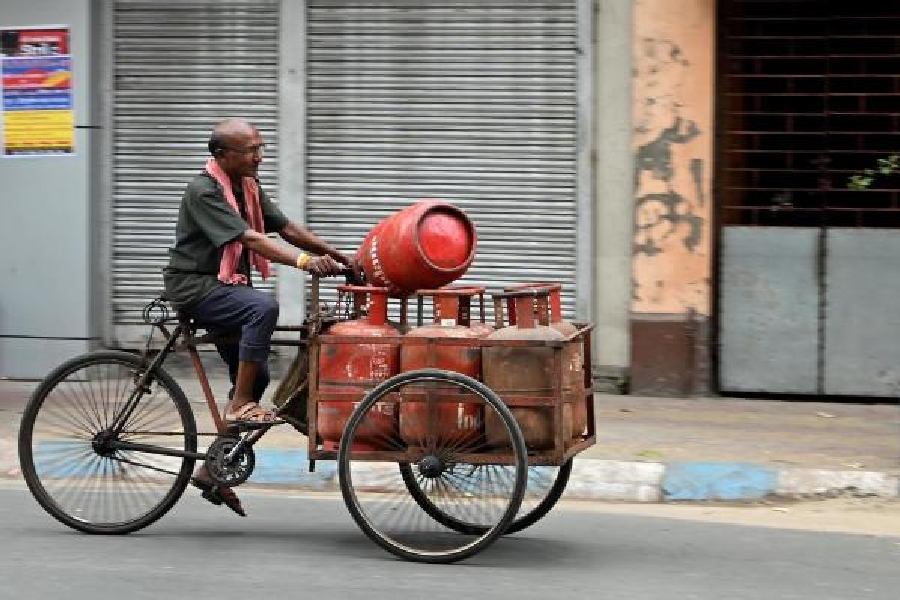 LPG cylinders being transported on a cycle van on  Amherst Street on Wednesday.
