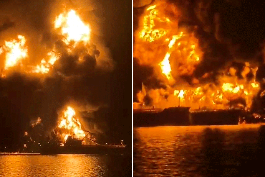 A ship burns, after Iranian explosive-laden boats appear to have attacked two fuel tankers in Iraqi waters setting them ablaze, according to port, maritime security and risk firms, amid the U.S.-Israeli conflict with Iran, in this screengrab taken from a handout video released March 12, 2026.