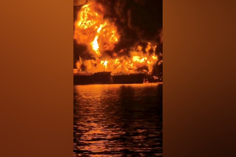 A ship burns, after Iranian explosive-laden boats appear to have attacked two fuel tankers in Iraqi waters setting them ablaze, according to port, maritime security and risk firms, amid the U.S.-Israeli conflict with Iran, in this screengrab taken from a handout video released March 12, 2026.