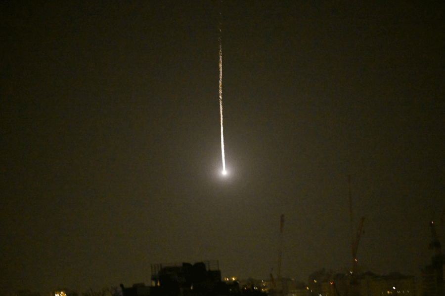 An Iranian missile flies toward Israel, amid the U.S.-Israeli conflict with Iran, as seen from Tel Aviv, Israel, March 12, 2026.
