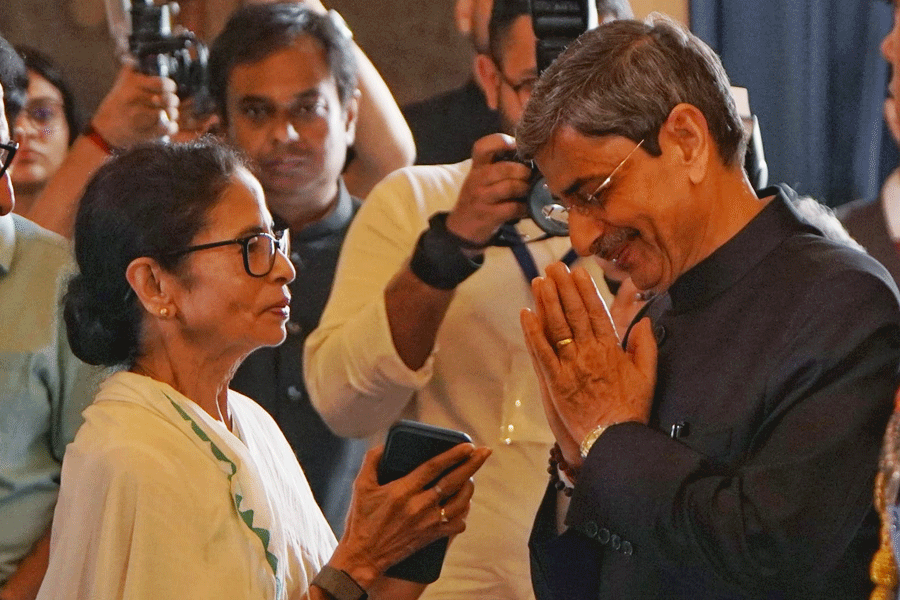 Governor R.N. Ravi and chief minister Mamata Banerjee during oath taking ceremony, in Kolkata, West Bengal on March 12, 2026.