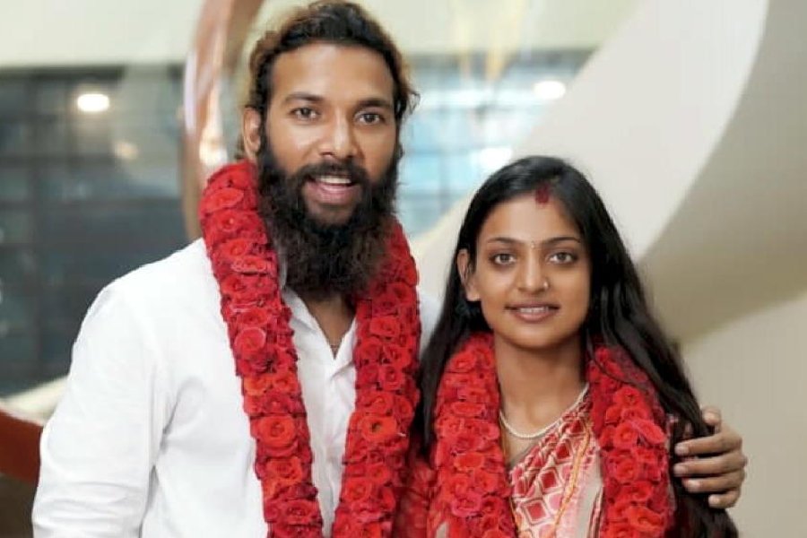 Monalisa from Indore, who went viral on social media during the Kumbh Mela, enters wedlock with her partner Farman Khan at a temple, in Thiruvananthapuram, Kerala, Wednesday, March 11, 2026.