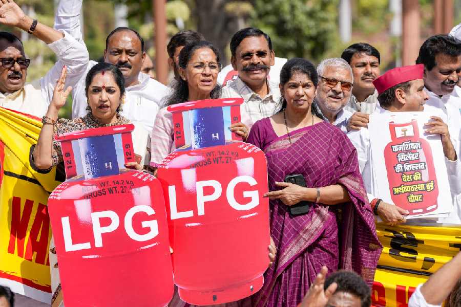 Protest staged in Parliament over 'LPG shortage' during the second part of Budget session, in New Delhi, March 12, 2026