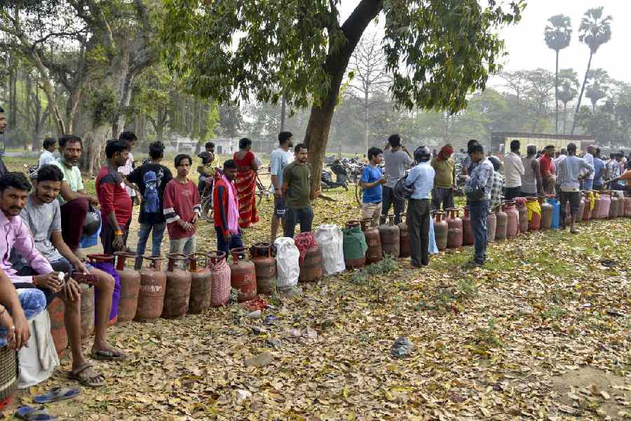 People queue up to get LPG cylinders, in Patna, Bihar, Thursday, March 12, 2026