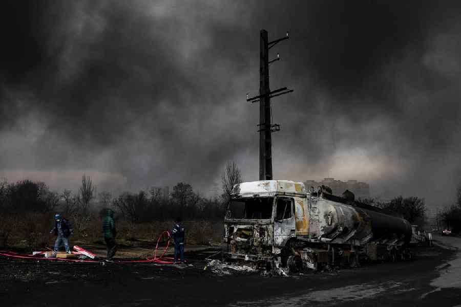 Smoke rises after a reported strike on Shahran fuel tanks, amid the U.S.-Israeli conflict with Iran, in Tehran.