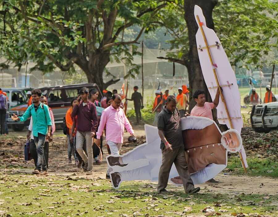 The prime minister landed in Kolkata almost an hour late. A sea of BJP workers and supporters waited around the vast ground, taking selfies with cut-outs of Modi